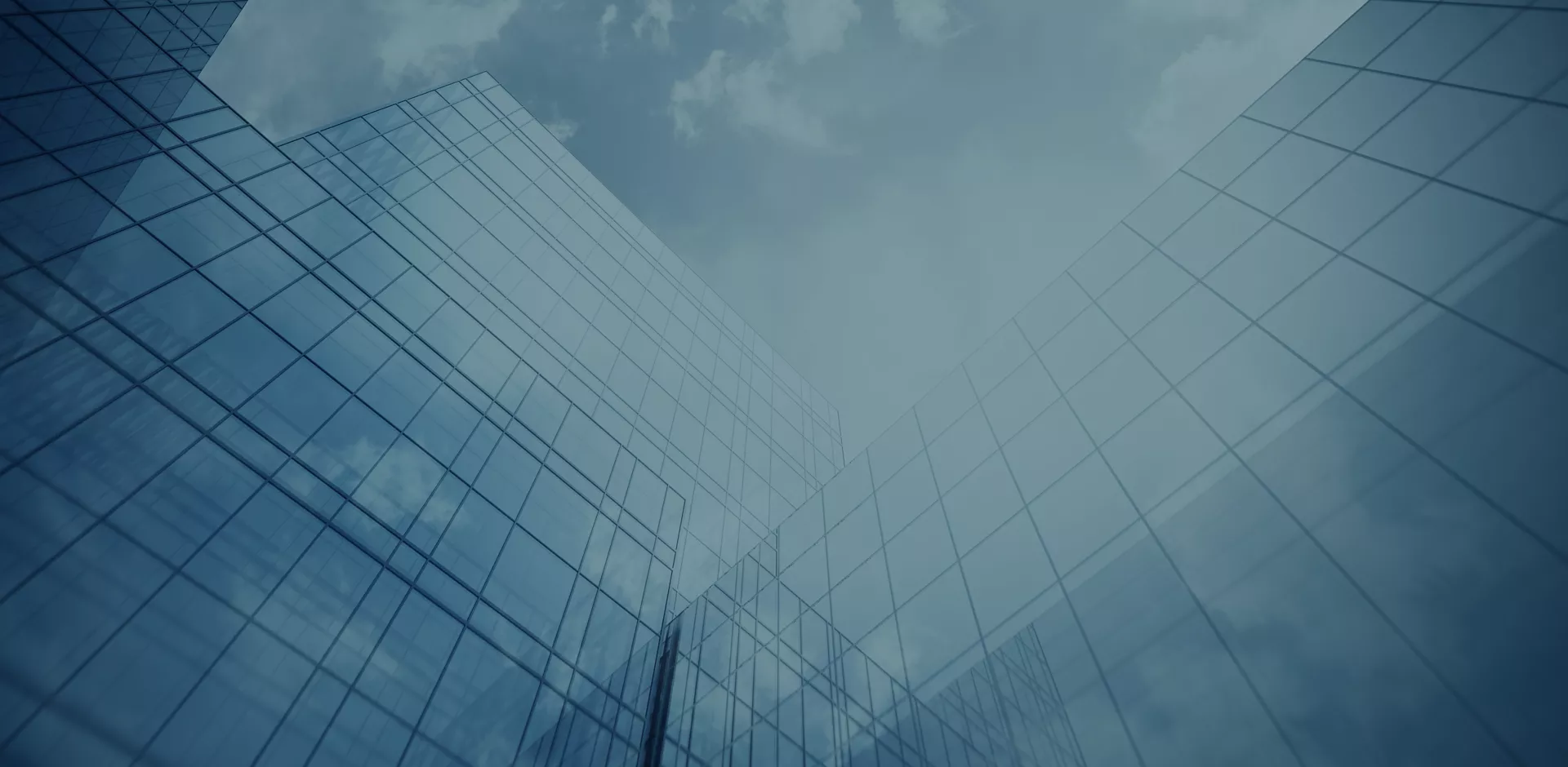 Tall Diatec Diagnostics building with windows and the sky with clouds