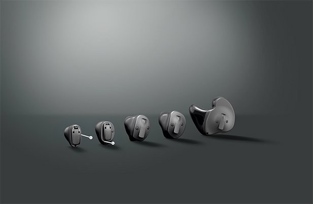 oticon_own_and-own_si_left_line-up_black_casting_long_shadows_with_background-617x403